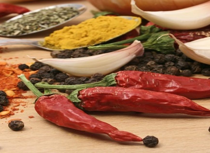 red peppers and other spices with garlic and onion