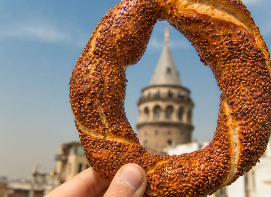 Turkish Bagel (Simit) and Galata Tower in istanbul, Turkey